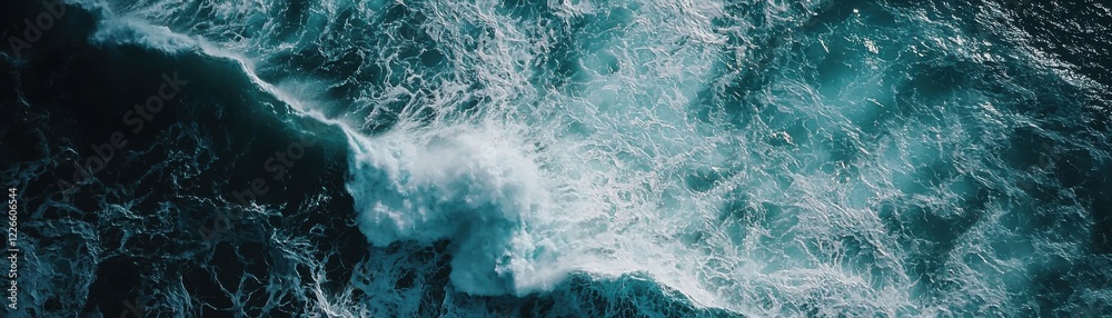 Fototapeta premium Stunning aerial view of ocean waves crashing against each other, highlighting the beauty of nature's elements. Perfect for environmental themes.