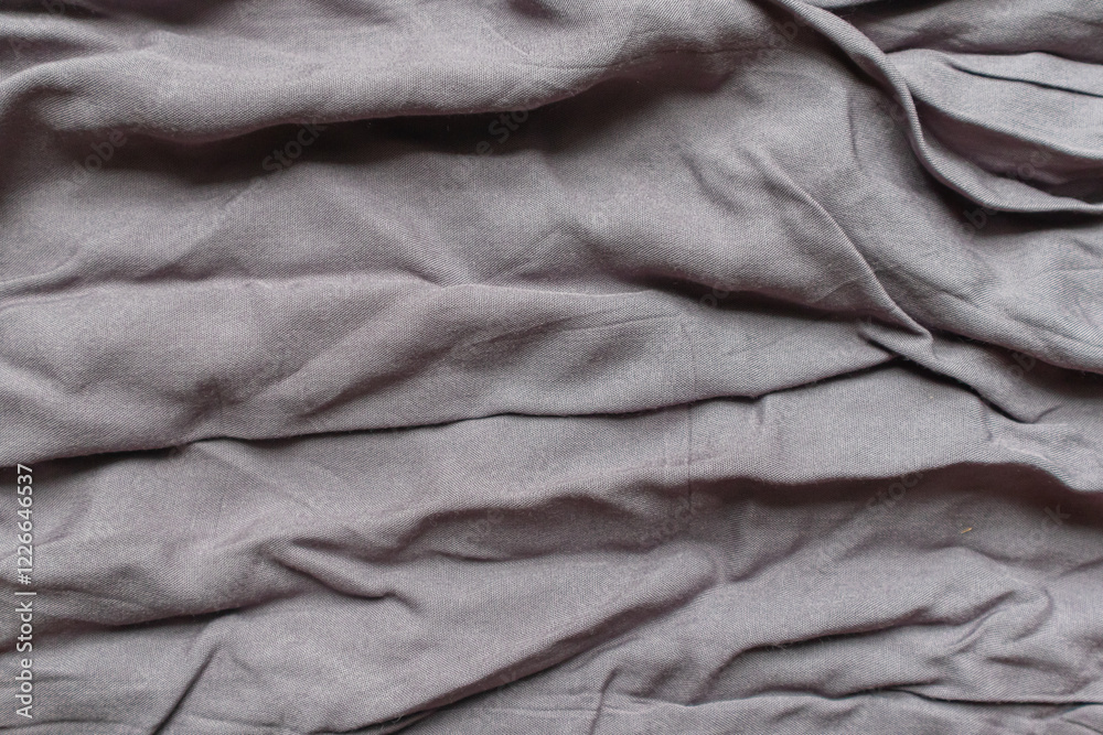 Obraz premium A crumpled gray cloth and and exposed to the light