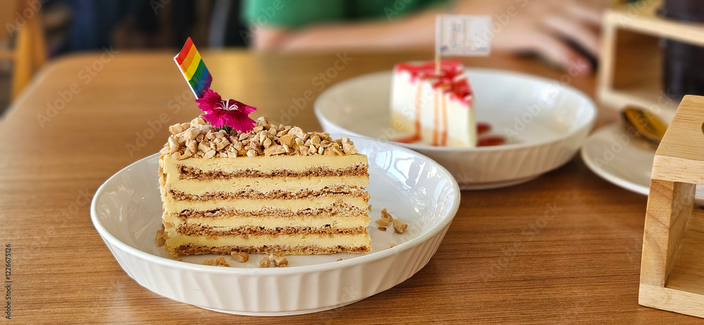Sans Rival Cake serving with mini flag in the coffee shop