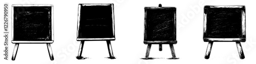 Vintage chalkboards lined up in a creative workspace showcasing empty space for messages or drawings
