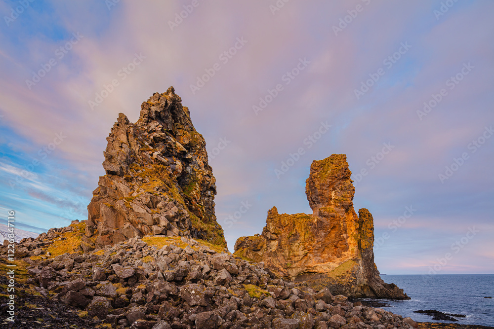 Lóndrangar; a pair of rock pinnacles consisting of solidified lava on the southern coast of Snæfellsnes peninsula, Iceland