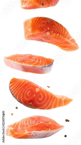 Fresh Raw Salmon Steaks in Vibrant Pink Color on a White Background Ready for Culinary Preparation and Presentation