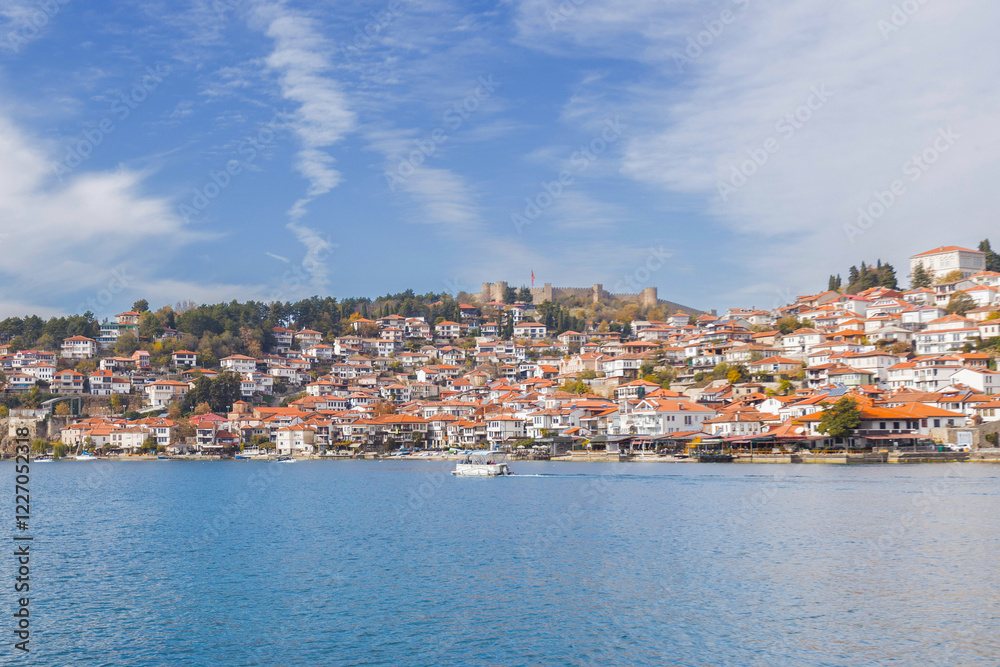 Picturesque view of Ohrid, North Macedonia, a historic town on Lake Ohrid shore, known for its charming architecture and stunning lake views, making it a popular tourist destination. Picturesque view of Ohrid, North Macedonia, a historic town on Lake Ohrid shore, known for its charming architecture and stunning lake views, making it a popular tourist destination.