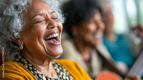 Seniors laughing while playing an old favorite song on the radio