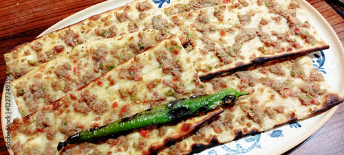 Turkish and Arabic Traditional Ramadan Bread Sliced Etli Ekmek (Pide or Lahmacun) photo