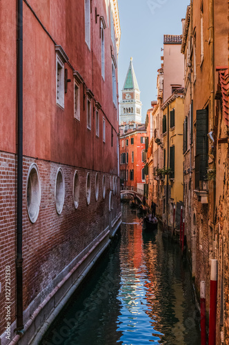 Canal with view over the campanile bell tower, Venice, Italy photo