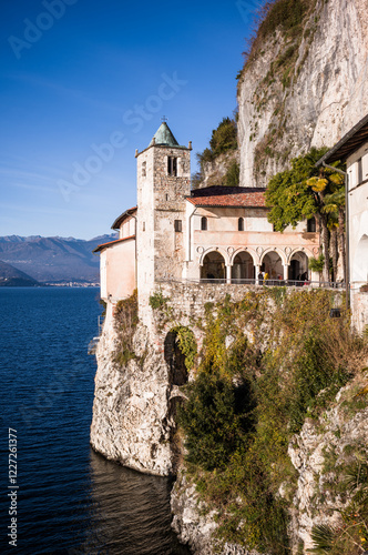 Santa Caterina del Sasso monastery on Lake Maggiore on a sunny day, Italy photo