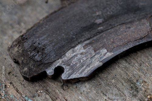 Worn out brake pad, close up photo