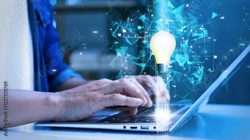 Hands typing on a laptop with a glowing lightbulb and futuristic digital elements, symbolizing innovation, creativity, and technology-driven ideas.