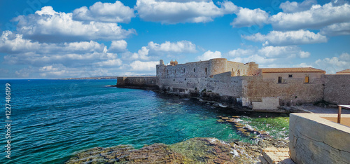 the sea around the ortigia peninsula in syracuse in the south of sicily on a beautiful and warm summer day