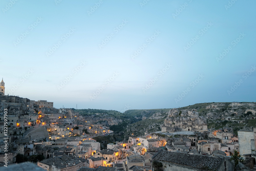Fototapeta premium Exterior aerial architecture and design at 'MATERA' Italian ancient cave dwellings inhabited since the Paleolithic, UNESCO World Heritage Site- Italy