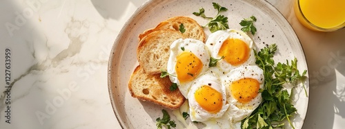 Delicious poached eggs on toasted bread with fresh herbs and orange juice on a bright backdrop perfect for breakfast promotion and copy space photo