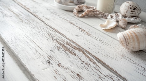 Vintage white wooden coffee table decorated with shells and cuttlefish bones in a serene Mediterranean dining room by the seaside