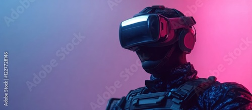 Futuristic Soldier in Advanced Body Armor Wearing VR Goggles with Soft Blue and Pink Background for Text Placement photo