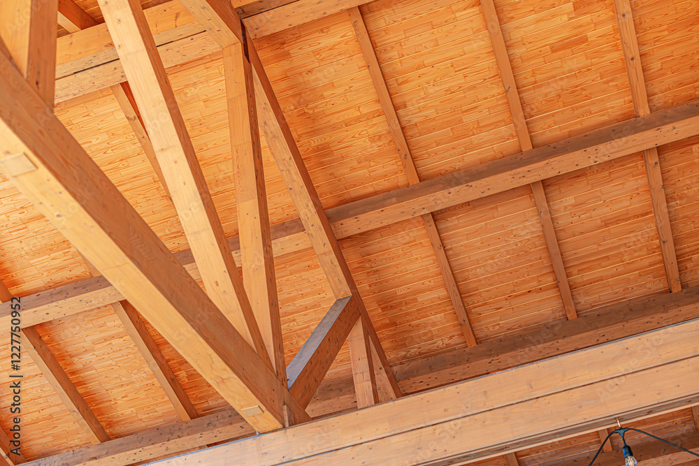 Construction of a wooden roof of a frame house.