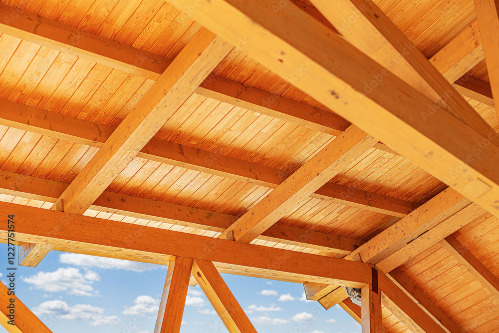 Construction of a wooden roof of a frame house.