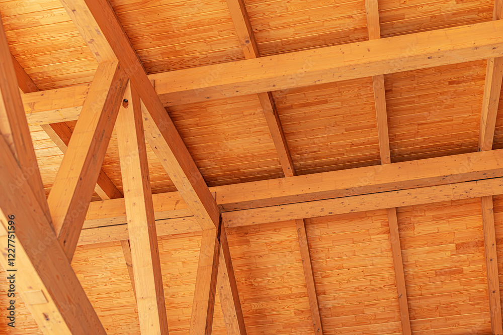 Construction of a wooden roof of a frame house.
