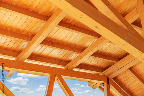Obraz na płótnie Construction of a wooden roof of a frame house. w salonie