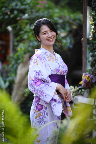 portrait woman with yukata dress in the garden