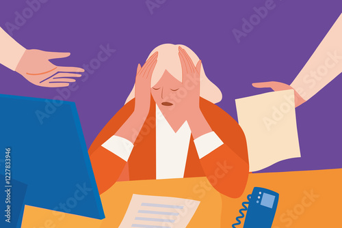 An overwhelmed and stressed worker at her desk photo