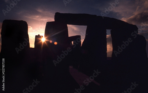 Silhouette at dawn of the ancient monument, Stonehenge. A prehistoric megalithic structure erected between 3100 BC and 1600 BC
