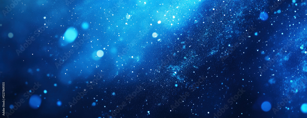 Obraz premium Abstract blue background with sparkling particles and bokeh effects. Cosmic, magical and festive feel, motion blur. Selective focus.