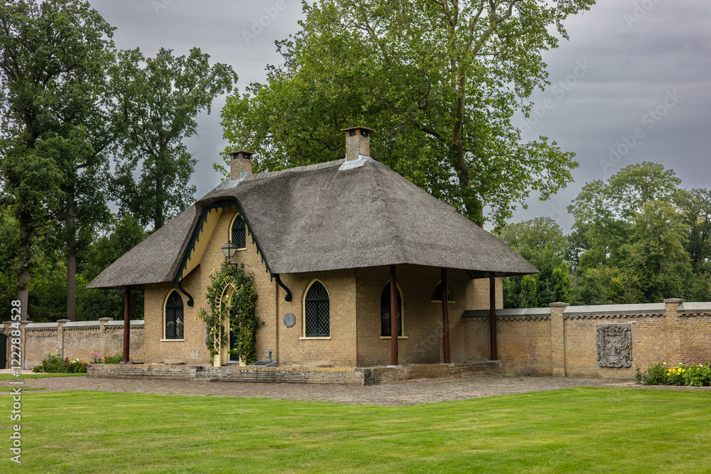 A charming brick house with a thatched roof, arched windows, and a green door covered in climbing plants. The house sits in a lush garden, with a cobblestone path leading to the entrance. A charming brick house with a thatched roof, arched windows, and a green door covered in climbing plants. The house sits in a lush garden, with a cobblestone path leading to the entrance.