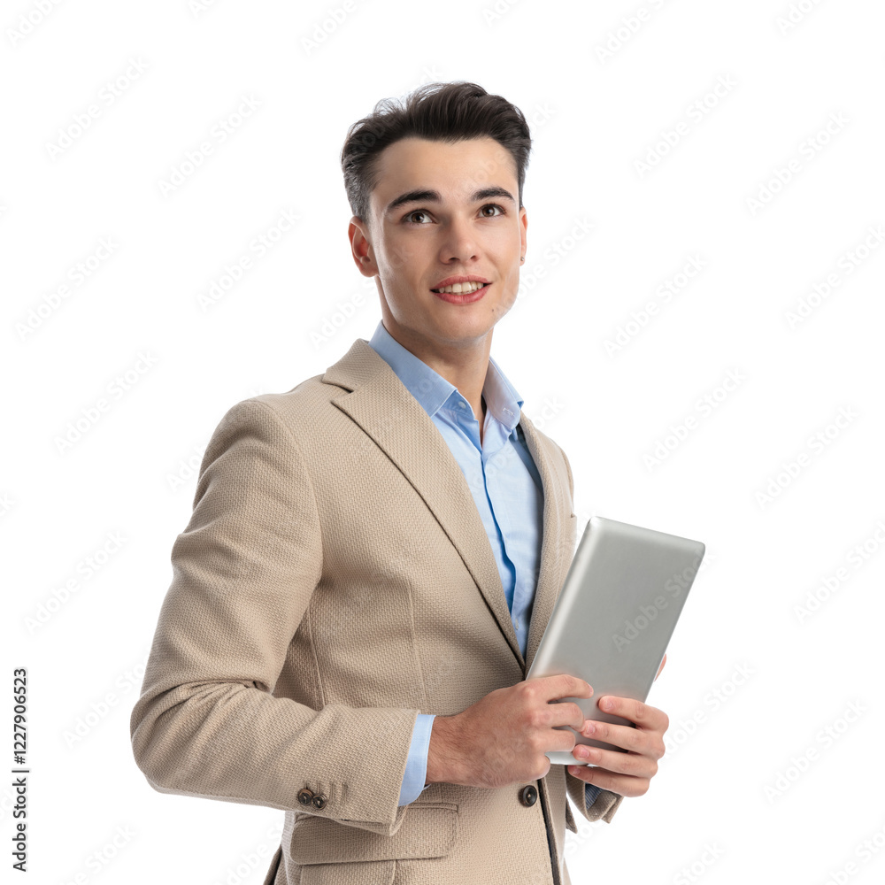 side view of young businessman with pad looking up side view of young businessman with pad looking up