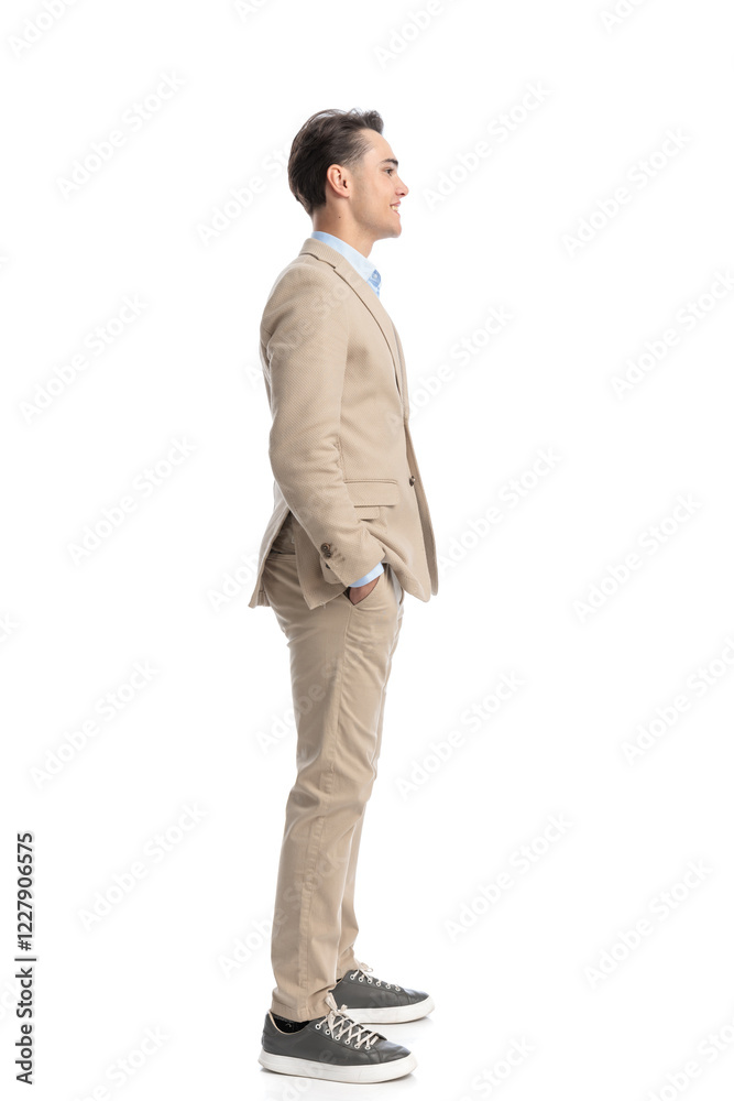 relaxed smart casual man waiting in line and smiling relaxed smart casual man waiting in line and smiling