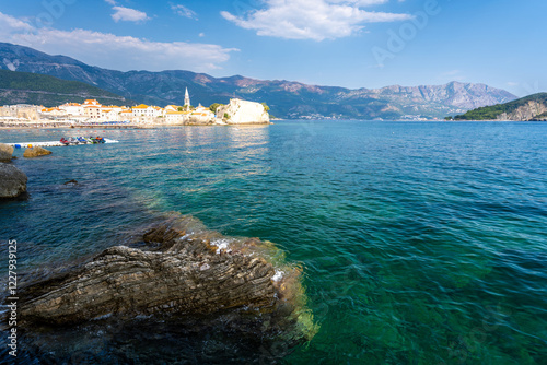 Obraz na płótnie view on Budva old town with azure water of adriatic sea in Montenegro w salonie