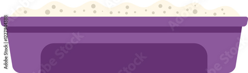 Purple litter box containing sand for a cat toilet training is lying on the floor