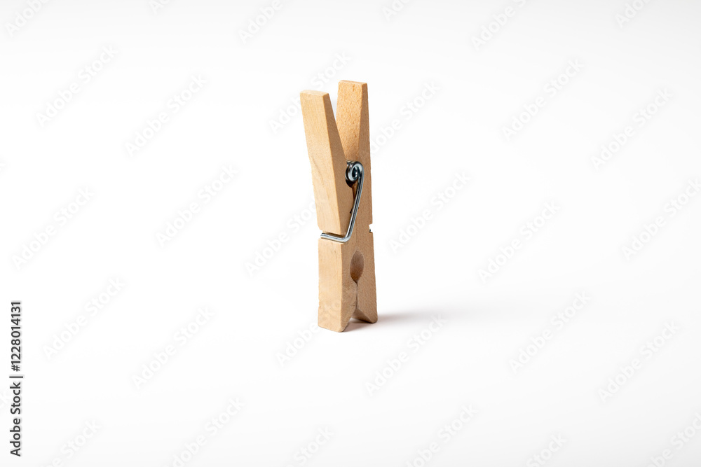 Wooden clothes peg isolated on white background
Wooden clothes peg isolated on white background