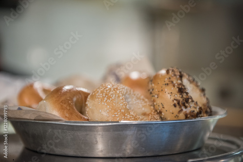 Assortment of bagels in silver plate at Rosenbergs Bagels and Delicatessen in the Five Points Historic Cultural District neighborhood.of Denver, Colorado. photo