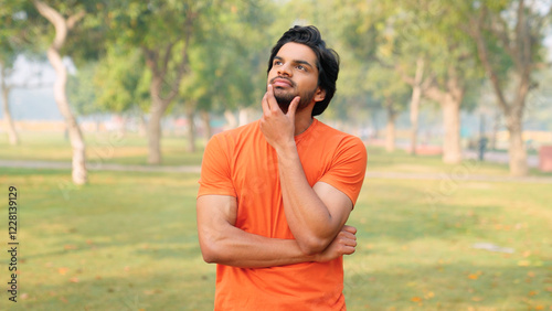 Indian Man Admiring with hand on Chin