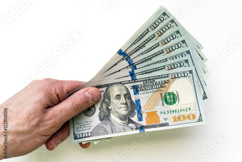 Man hand holding new 100 dollars USA folded like a fan, released after 2013.  White background, isolate photo