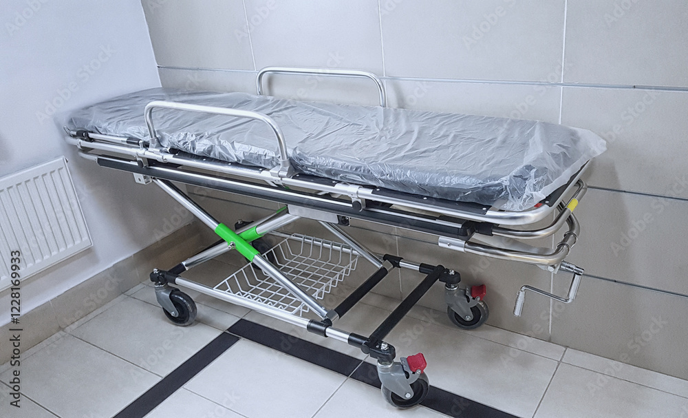 empty Medical stretcher trolley with wheels in a hospital corridor, mobile photo