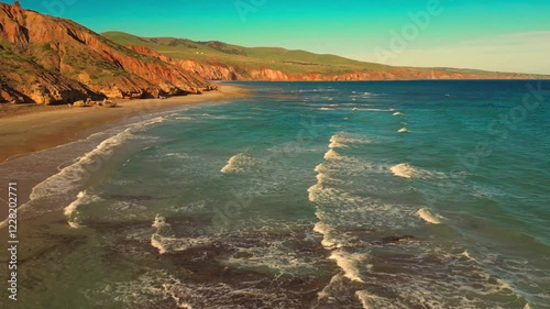 Aerial view of seascape along the vast beach on the South Coast during summer photo