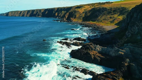 Aerial view of seascape along the vast beach on the South Coast during summer photo