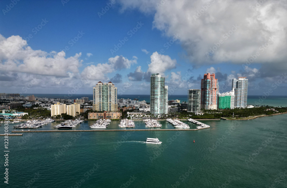 Naklejka premium Miami south beach view. Yacht club. Marina in Miami, Florida. Biscayne bay. Downtown Miami marina with luxury yacht. Summer vacation. Luxury South beach marina. Luxury yacht. Seaside marina