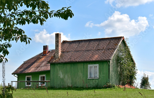 Typical country house, small colourful Scandinavian-style cottage, Lithuania photo