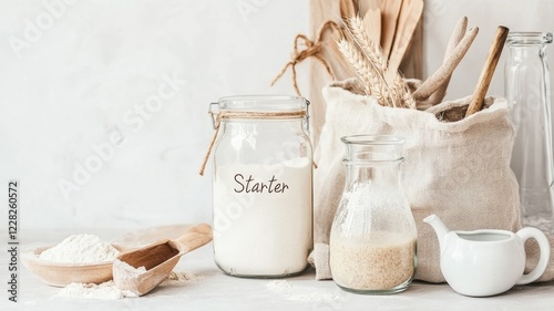 Organic baking ingredients and sourdough starter for homemade bread preparation,National Sourdough Bread Day
