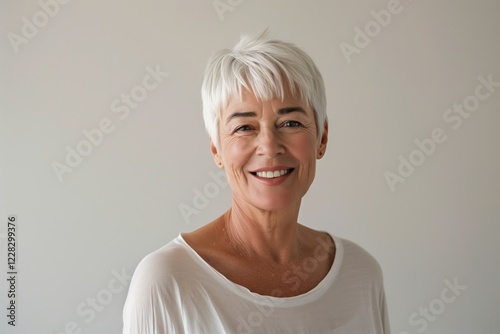 Wallpaper Mural A joyful portrait capturing the happiness of a senior woman with short white hair. Keywords age, confidence, content, elderly, grace, grandmother, happiness, smile, wisdom, wrinkles Torontodigital.ca