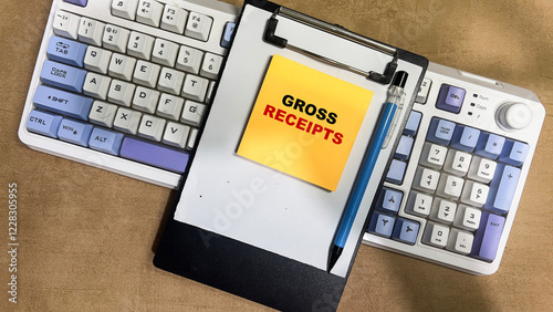 Concept of Gross Receipts write on sticky notes isolated on Wooden Table.