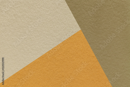 Texture craft beige, brown and yellow shade paper background, macro. Structure vintage ocher abstract cardboard