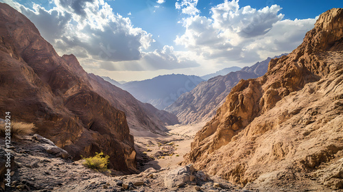 Clouds drifting lazily above a serene canyon carved into the uae mountains, landscape, uae. Serene Canyon. Illustration