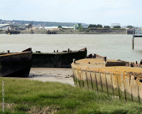 Photography WWII concrete barges abandoned on shore of Thames Estuary