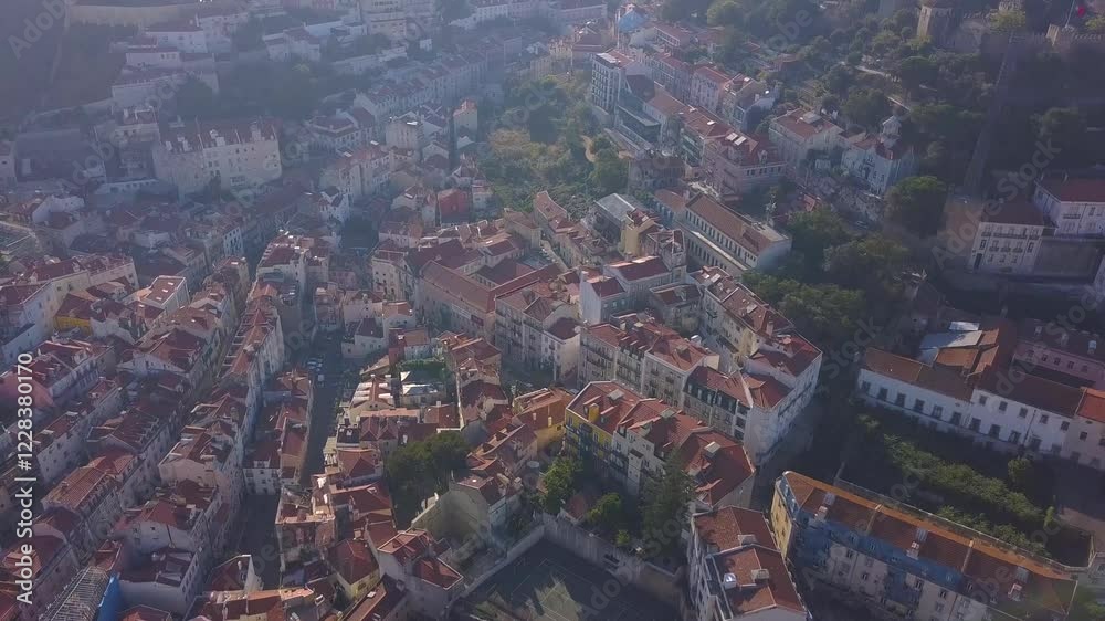 LISBON, PORTUGAL - JANUARY 22, 2025: Glimpse of vibrant neighborhoods and colorful rooftops in historic Lisbon LISBON, PORTUGAL - JANUARY 22, 2025: Glimpse of vibrant neighborhoods and colorful rooftops in historic Lisbon