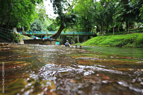 Pha Tat Waterfall (Namtok Pha Tat) A large waterfall within the area of Khuean Srinagarindra National Park Kanchanaburi, Thailand  photo