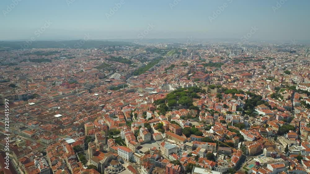 LISBON, PORTUGAL - JANUARY 22, 2025: Aerial view of vibrant city landscape highlighting historic architecture and bustling streets