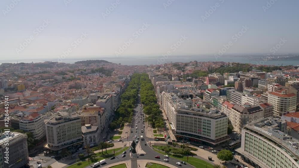 LISBON, PORTUGAL - JANUARY 22, 2025: panoramic view of urban landscape showcasing vibrant streets and greenery in Lisbon, Portugal LISBON, PORTUGAL - JANUARY 22, 2025: panoramic view of urban landscape showcasing vibrant streets and greenery in Lisbon, Portugal